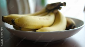 Bananas on Dining Table: Fresh Fruit Display for Healthy Eating