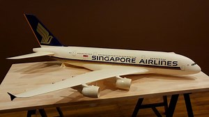 This designer makes model airplanes out of manila folders. | Culture Insider