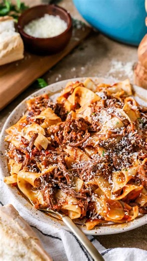 Fall-apart tender short ribs braised low and slow in a rich tomato–red wine sauce. This short rib ragù is the definition of comfort food—perfect with pasta, potatoes, or creamy polenta. Want to try it yourself? Comment “recipe” below or find it here: https://sugarspunrun.com/short-rib-ragu/ #beefragu #dinner #dinnerecipe #comfortfood | Sugar Spun Run