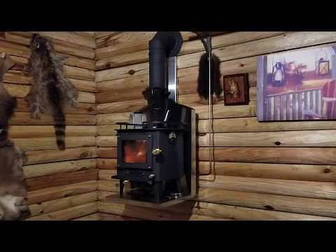 Cubic mini wood stove in Grandpa's tiny cabin