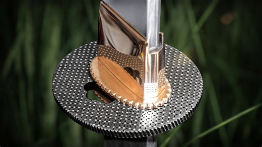 Tsuba: Crafted from Steel, Detailed with Silver Inlay