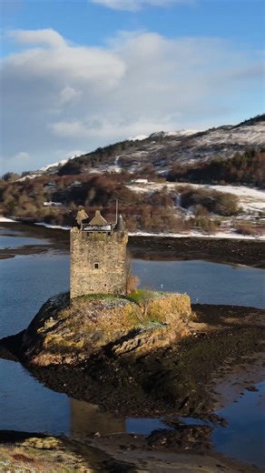 A fly around Castle Stalker just as the sun decided to light it up #CastleStalker #Scotland #Snow