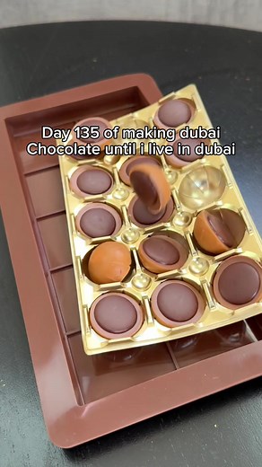 Indulging in Dubai Chocolate with Gold Spray and Toffee