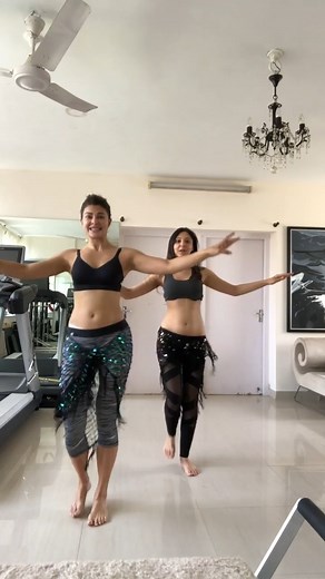 Sanjana Muthreja is the amazing dancer. "Belly dance, the mesmerizing art of Arabic dance, invites you to explore a world of sensual expression and rhythmic enchantment. Our belly dance classes, designed for everyone from beginners to those seeking to perfect their skills, provide comprehensive guidance on the captivating movements and techniques that make this dance form so alluring. Dive into the sultry allure of Shakira-style belly dance, as our dancer effortlessly demonstrates the shimmy, be