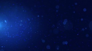 Blue Dust Particles with a Lens Flare. Particles Background. 4K