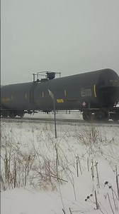 Northbound Union Pacific train with UP 1041 in the snow on the Spine Line