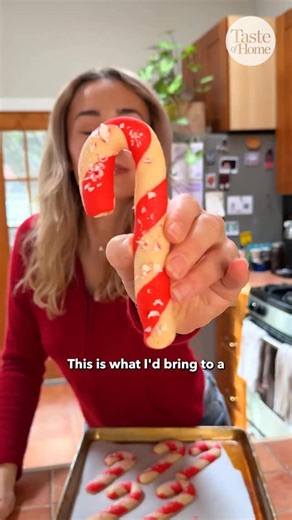 Taste of Home on Instagram: "Impress everyone at your holiday party or cookie exchange with these classic, whimsical candy cane cookies. @val_goodrich 🔗 Get the recipe at the link in our bio or comment “Candy Cane Cookies” and we’ll send the link to your DMs. #holidaybaking #christmascookies #cookierecipes #candycane #candycanecookies"