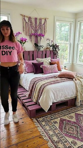 From empty space to a cozy purple retreat using recycled pallets.