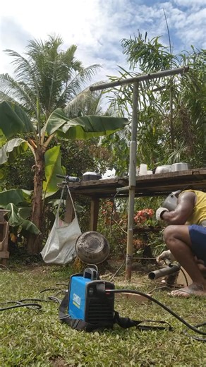 Mom asked to repair the clothes line before flying out. Damn the sun was hot. Madang why umi sa gat liquor ban lo weekends? Even my camera switched off half way due to over heating. #fypシ゚viralシ | Peejay Waringe