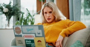 Home, surprise and woman with laptop, wow and email notification with mistake, expression and internet. Person, apartment and girl with computer, reaction and shocked for online news and announcement