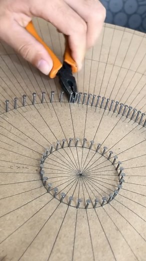 Art Daily Dose | The artist designs mesmerizing mandalas by combining nails and thread on circular wooden boards. With precision and creativity, he hammers... | Instagram