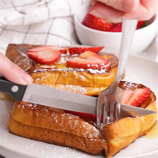 Strawberry Stuffed French Toast - a fun (and 20 minute) breakfast or brunch idea for Valentine's Day made with brioche bread, cream cheese and strawberries! | Feel Good Foodie