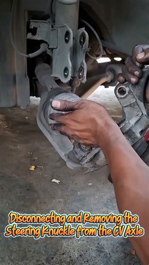 Disconnecting and Removing the Steering Knuckle from the CV Axle