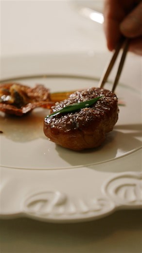 A Taste of Essence At Plénitude, veal sweetbread meets the intensity of a "myoga" braising jus, a bold composition where French finesse meets unexpected depth. | Cheval Blanc Paris