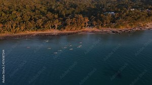 People on a kayaking adventure by the shores of the Sunshine Coast - QLD Australia