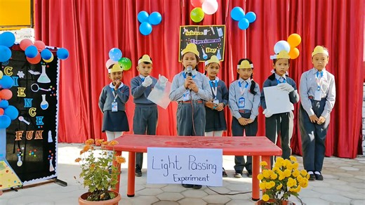 Science is fun! Grade 1 & 2 students demonstrating the Light Passing Experiment. | Simran Academy