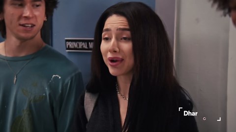 Hiding her face after being called ugly?