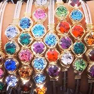 54 reactions · 6 comments | Look at this WOW stack of custom birthday bracelets from @sistersoflexington! Each one is custom made so it tells YOUR story! Get yours now. #weloveourstores | Earth Grace Jewelry | Facebook