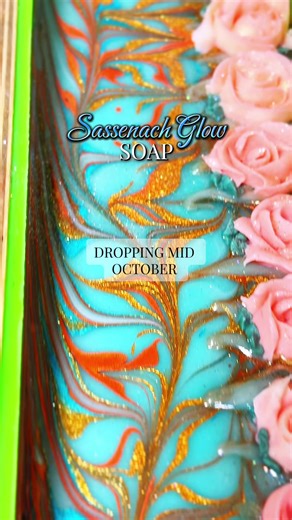 🔥✨ Meet Sassenach Glow, the second soap in my Outlander Inspired Collection. With radiant swirls of turquoise, fiery orange, and shimmering gold, this bar captures Claire’s bold spirit and the spark she carries between two worlds. Striking and luminous as the Highlands themselves. 🌿💫 Where Love and Legend Meet. 🏔️❤️ Perfect for Outlander fans, lovers of Scottish romance, and anyone who wants a soap that shines as brightly as it nourishes. #Soap #OutlanderInspired #soapswirltechnique #SoapMak