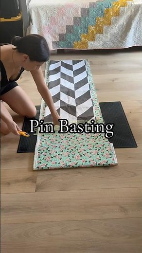 Pin Basting my baby Herringbone Quilt.