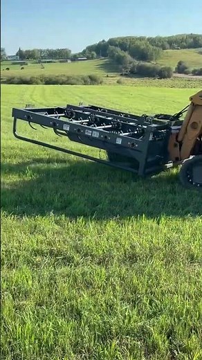 Square bale picking and loading made easy with a bale accumulator attachment.