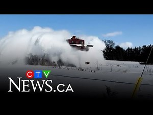 Train barrels through heavy snow in Ont.