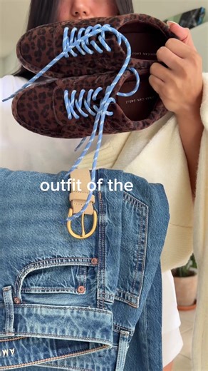 it's the hair tucked into the sweater for us