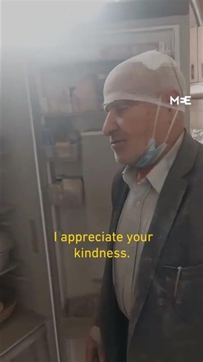 Iranian man offers journalist food while he documents his destroyed home