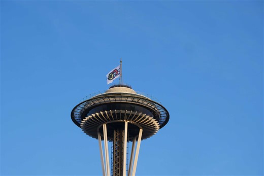Microsoft flag flies atop Space Needle to celebrate company’s 50th anniversary