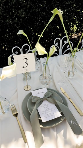 SHE IS EVERLI ~ Wedding Stationery & Signage on Instagram: "You don’t need to redesign your menus to make them feel special 🤍 A simple bow is all it takes to transform a classic menu into an elevated, intentional detail that feels timeless — not trendy. Perfect for the bride who loves clean design, soft romance and effortless styling. Add our luxurious personalise ribbons and let the details do the talking! Because sometimes the most beautiful touches are the simplest ones 🕊️ Order the Fleur R