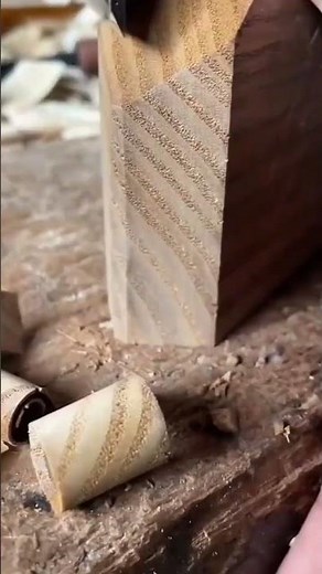 The process of carving wood using simple chisels