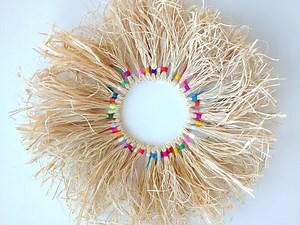 How to Make a Yarn Wrapped Raffia Wreath