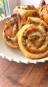 One For Baby, One For Me 💫 . . . Tuna & Pesto Pinwheels . INGREDIENTS: 1 sheet of puff pastry 2 tbsp pesto 1 tin of tuna drained 1 handful of spinach finely diced 1 handful of grated cheese . METHOD: Turn the oven to 180 degrees c fan. Unroll the pastry and spread the pesto over one side. Then add the tuna, spinach and cheese. Roll the whole thing into one sausage horizontally and slice into 1 inch thick rounds. Lay the pinwheels on a large tray lined with baking paper. Brush with either milk o