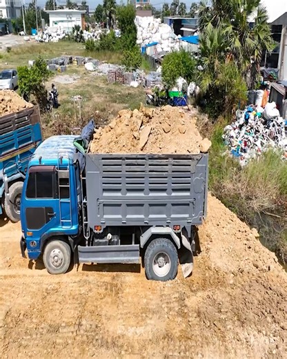 Part 16 - Building Lowlands by Heavy Equipment Team Action Trucks Pouring Loads with Bulldozers Spreading Soil #bulldozer #caterpillar #reelsusa #heavyequipment #construction #earthmoving | Construction World