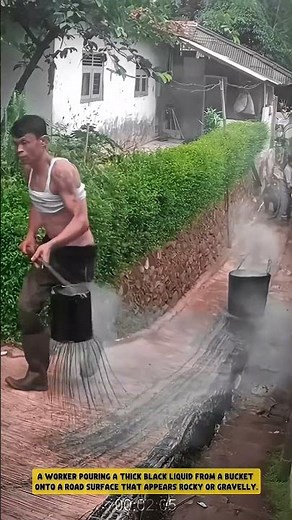 The process of prime coating a road with liquid asphalt before paving it