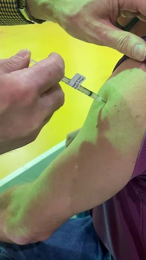 video of man retractable needle