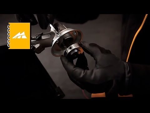 How to mount the trimmer head or cutting blade