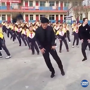 2M views · 58K reactions | Daily suffle dance at school, led by the principal himself! He could be the coolest primary school principal in China. #suffledance #school | China Daily | Facebook