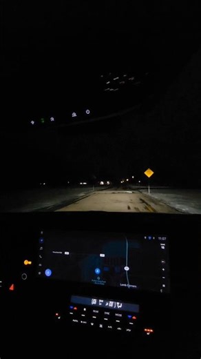 Night POV speed hump on icy pavement — Toyota Sienna