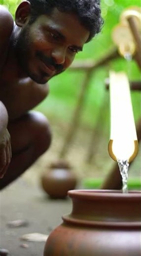 A tribal man builds water-collecting system using only bamboo and a large banana stem near his home🔥