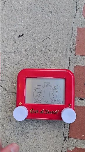 Beavis and Butthead on an Etch a Sketch