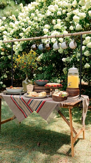Mary Hollis Huddleston on Instagram: "A rustic brunch buffet with the @southernlivingmag collection for @dillards. I loved creating this table with glazed stoneware pieces from the Astra Collection. The serving pieces come in a variety of colors, all with an elevated organic feel. Once again, I used a @pendletonwm blanket as a table throw (also found @dillards). These blankets are timeless, warm and remind me of my favorite family trips out west. The table and decorative rod are from @ikeausa. I