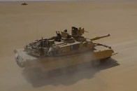 军武回顾：“艾布拉姆斯”M1A2C主战坦克的主炮是一门德国莱茵金属公司研发的120毫米M256滑膛炮 可发射M829A4尾翼稳定脱壳穿甲弹_腾讯新闻