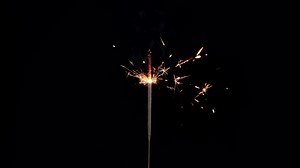 Sparklers fireworks for event celebration, New Year Eve, Christmas, birthday on black background
