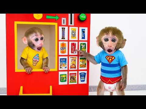 Monkey Baby Bon Bon and ducklings eat giant M&M candies together in the park