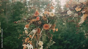Wedding ceremony decorations. Boho wedding ceremony in the forest by the lake. Autumn colours ceremony. High quality 4k footage.