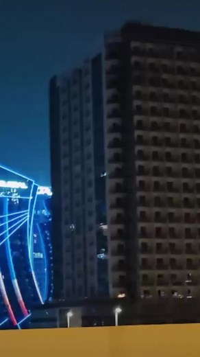 Stunning Nighttime Cityscape with Illuminated Buildings