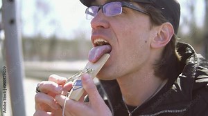 The man hit the tongue with a mousetrap. Crazy guy.