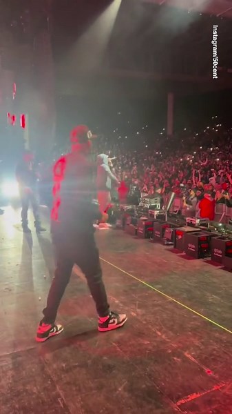 50 Cent surprises the crowd as he brings Eminem onto the stage