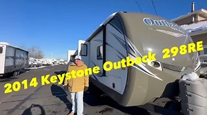 Look at this beautiful used 2014 Keystone Outback 298RE, This was...